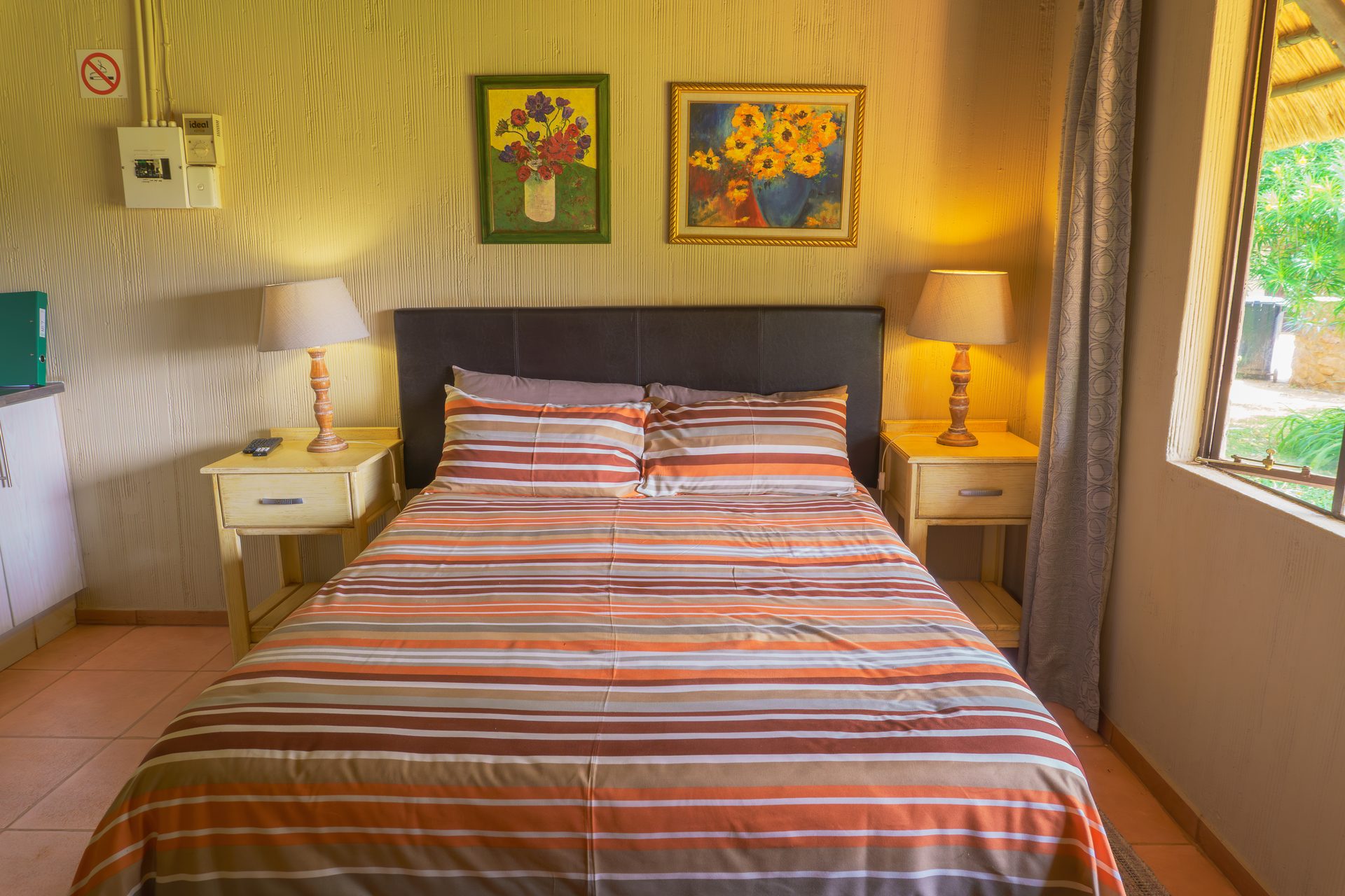 Lounge in 4-sleeper self-catering chalet at Gallery Inn Bela Bela