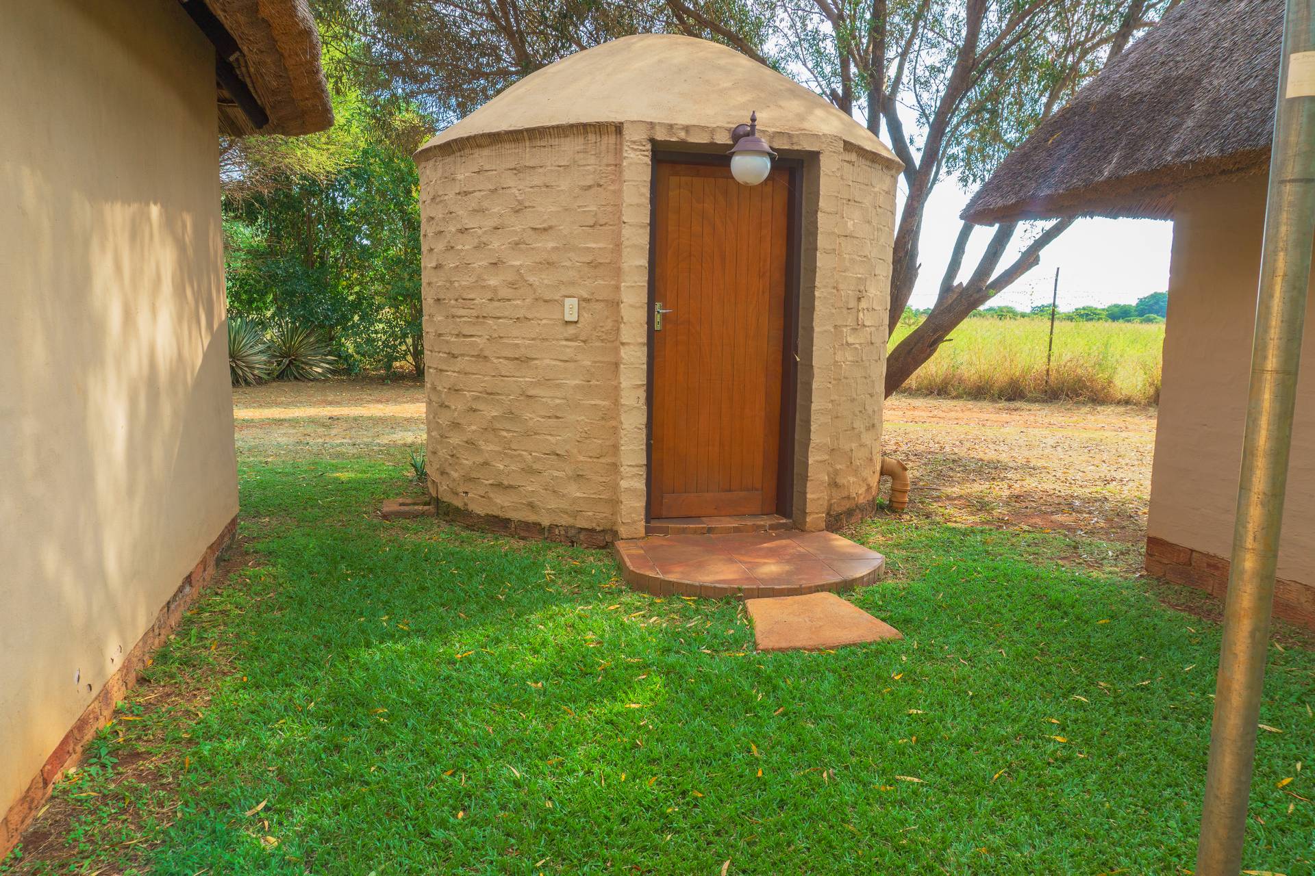 Patio of 8-sleeper group chalet at Gallery Inn Bela Bela
