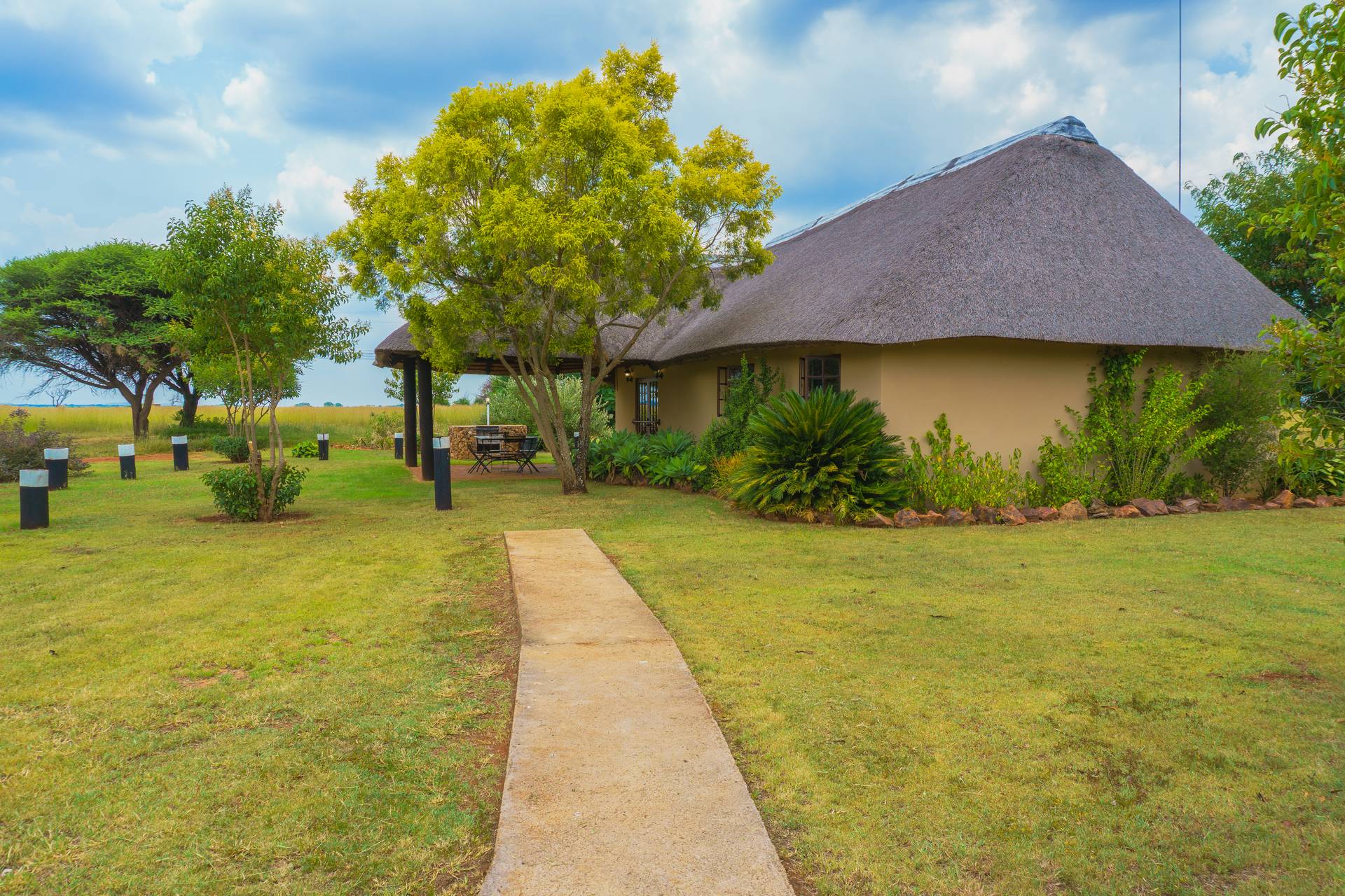 Comfortable lounge in self-catering chalet at Gallery Inn Bela Bela