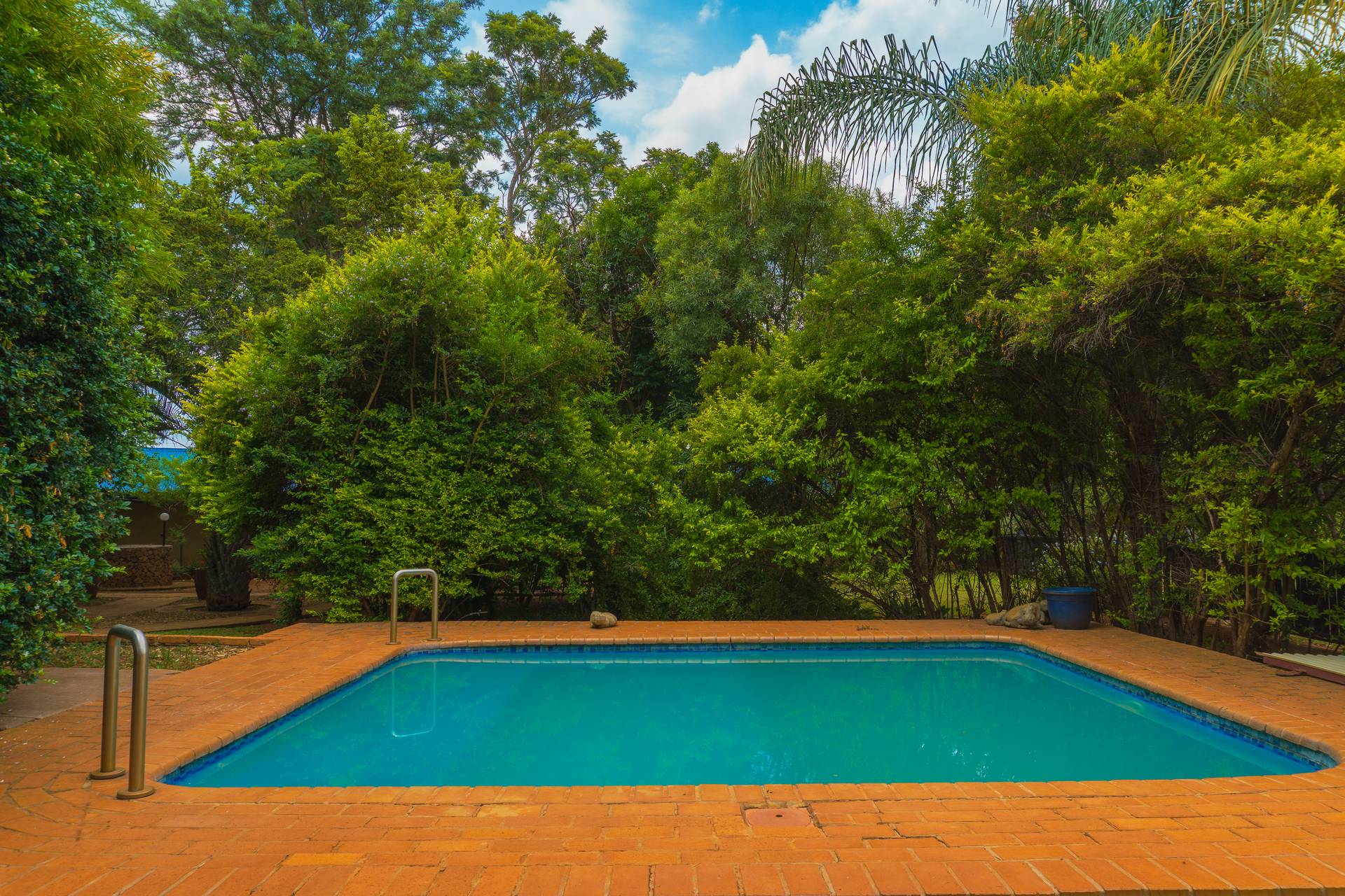 Poolside relaxation at Gallery Inn Bela Bela self-catering resort