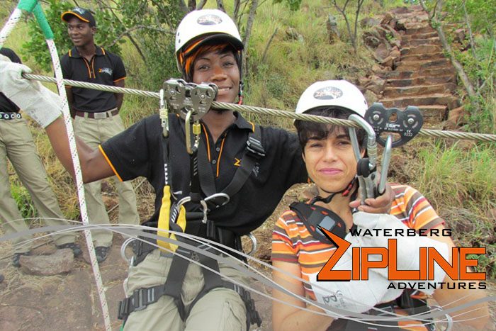 Waterberg Zipline guide preparing guest for the canopy tour near Bela Bela Limpopo